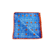 Pochette in Seta Azzurra con Micro Fantasia Arancio – Stile Sofisticato e Vivace